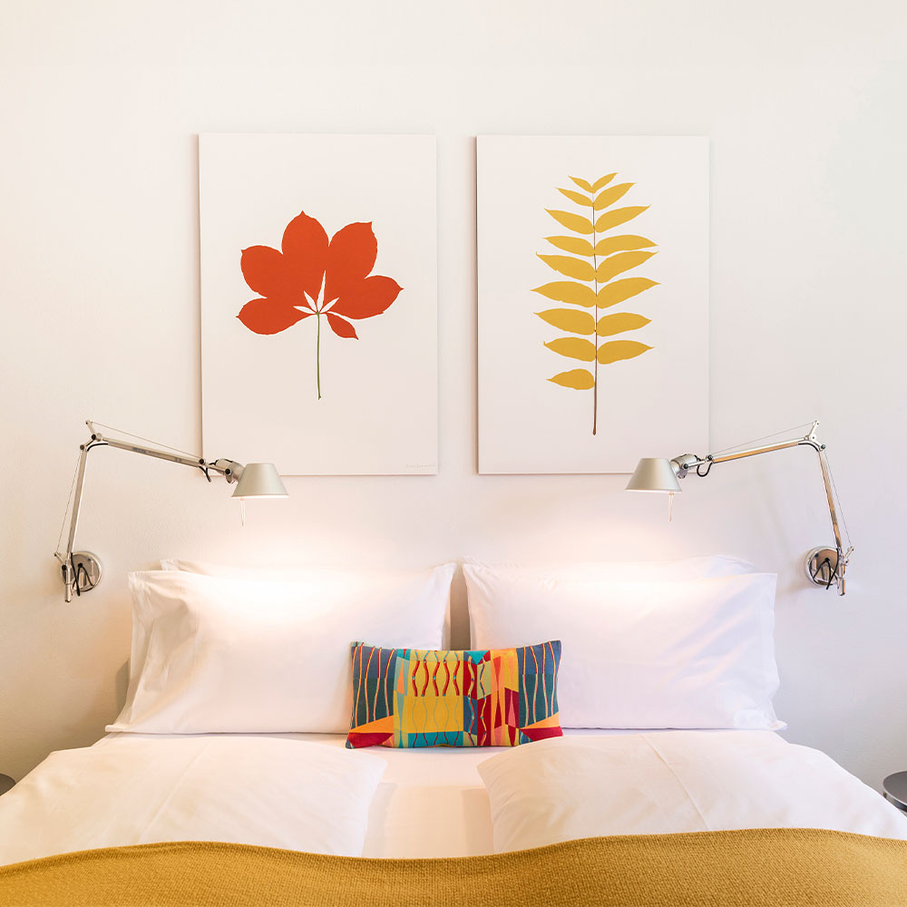 Die Tolomeo Wall Wandleuchte mit zwei Gelenken f&uuml;r maximale Flexibilit&auml;t, erh&auml;ltlich in Aluminium, Schwarz und Wei&szlig; &ndash; ideal f&uuml;r Schreibtische und Arbeitsbereiche.