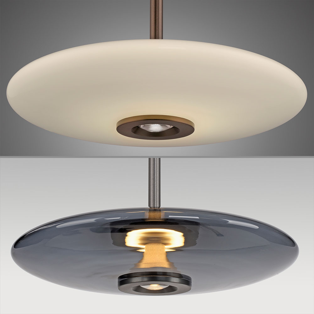 Die Einzelpendelleuchten der Pure Vitrum Serie zeichnen sich durch hochwertiges Glas in Rauchgrau oder Opalglanz, Up- und Downlight, eine exzellente Farbwiedergabe (CRI > 90), dimmbare Lichtsteuerung, variable H&ouml;henverstellung und Schutzart IP20 aus.